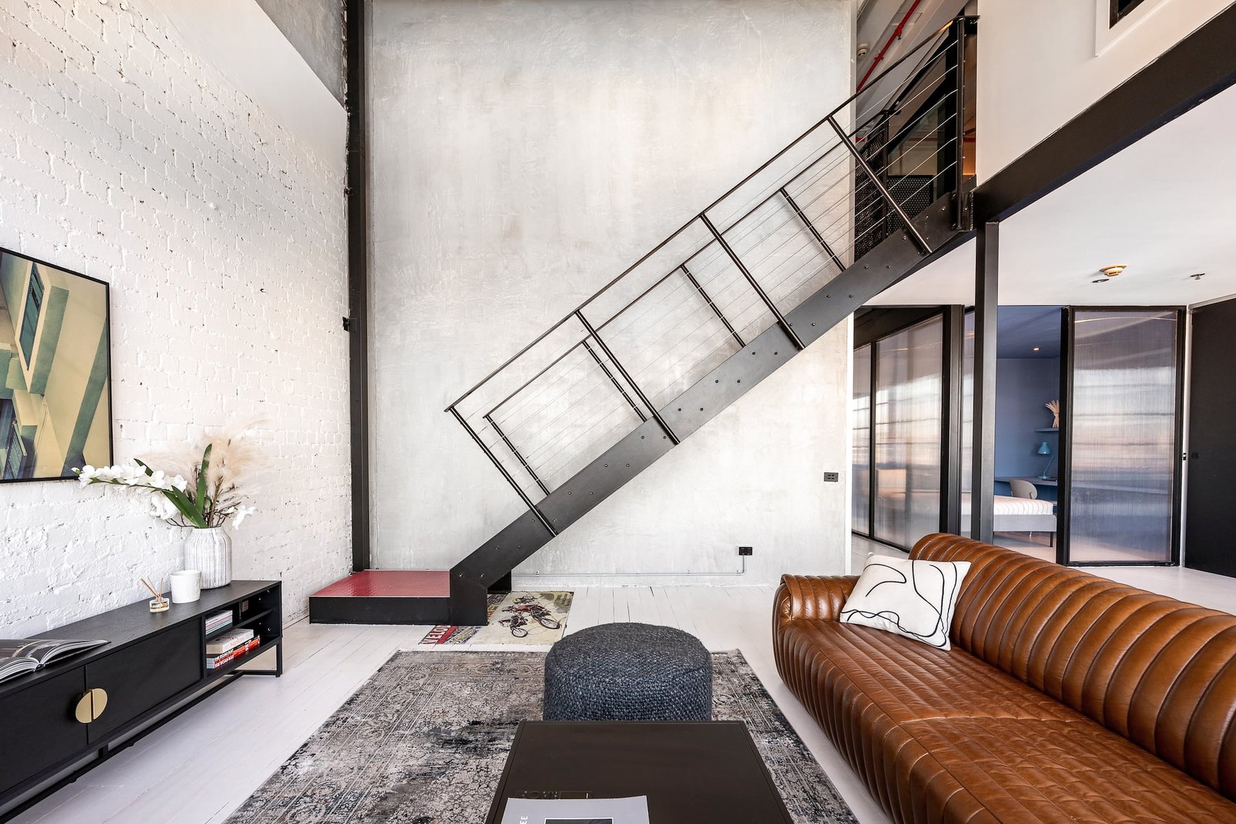 The Warehouse Loft — double-height living
